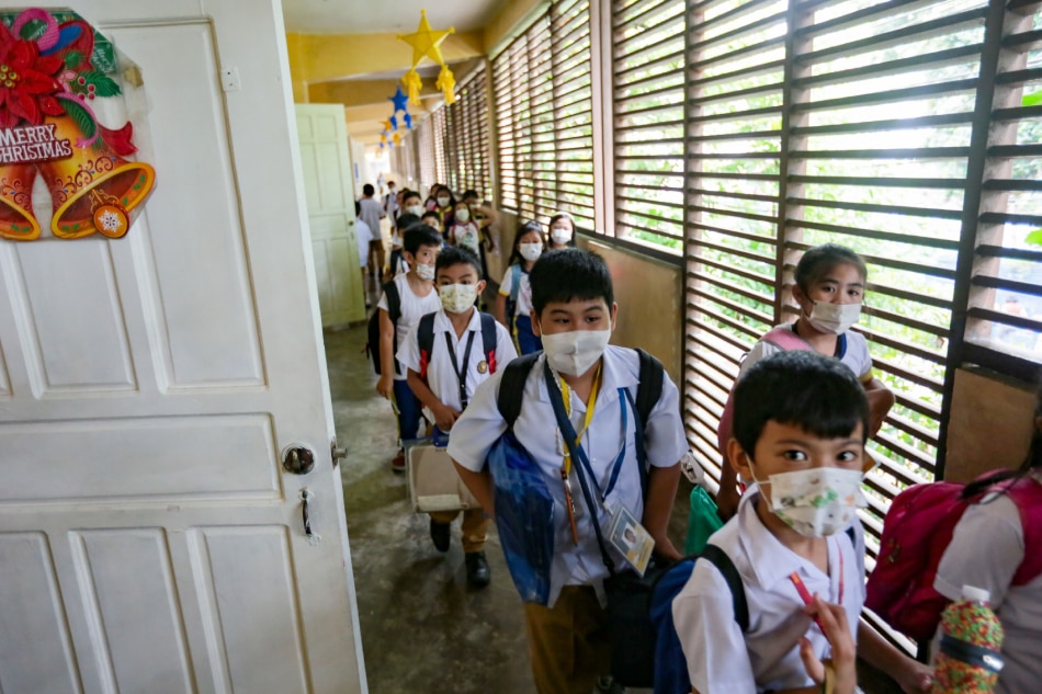 Students at Ilaya Barangka Integrated School in Mandaluyong prepare to attend activities on National Students’ Day, Nov. 17, 2022. George Calvelo, ABS-CBN News/File