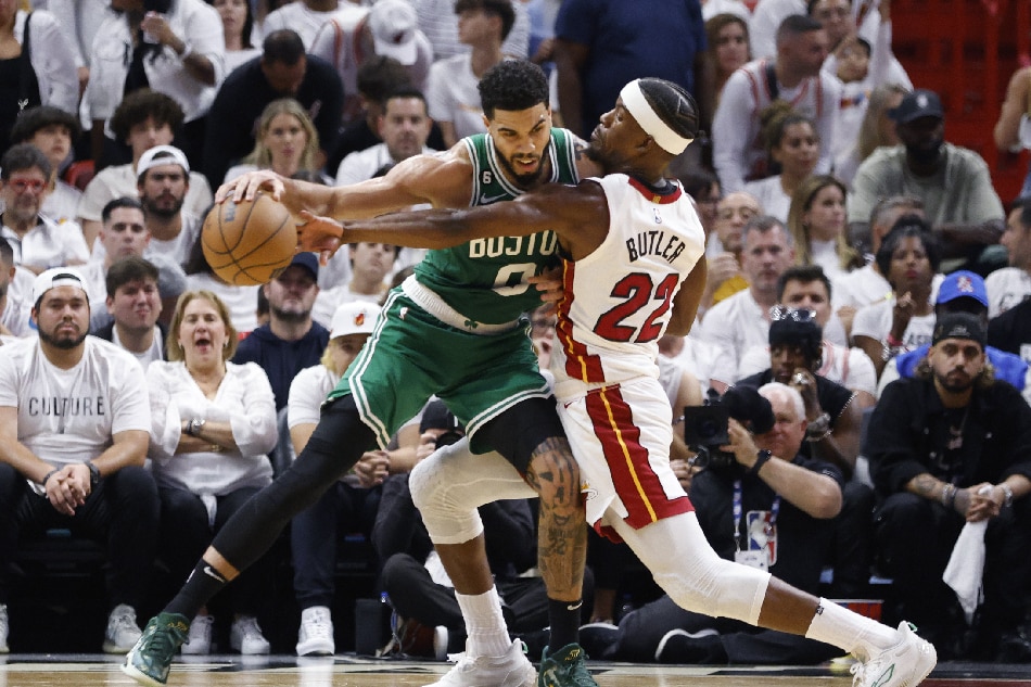 Miami Heat forward Jimmy Butler (R) defends Boston Celtics forward Jayson Tatum (L) during the second half of the NBA basketball Eastern Conference Finals playoff game four between the Miami Heat and the Boston Celtics at the Kaseya Center in Miami, Florida, USA, May 23, 2023. Rhona Wise, EPA-EFE