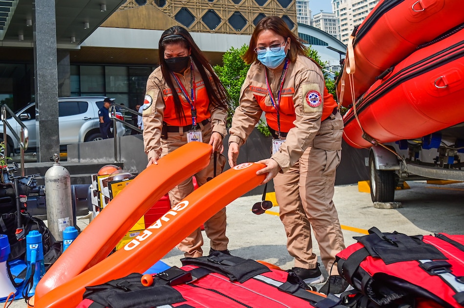 Metropolitan Manila Development Authority and Metro Manila Disaster Risk Reduction and Management Council personnel check rescue equipment such as fiberglass boats, aluminum boats, rubber boats, life vests, machinery at MMDA office in Pasig City in preparation for possible dispatch once typhoon Mawar enters the Philippine area of responsibility. Maria Tan, ABS-CBN News 