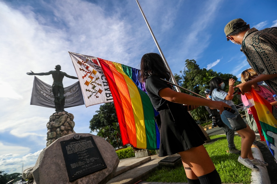 Members of the LGBT community gather inside UP Diliman and carry rainbow flags for the UP Pride March on October 30, 2020 Jonathan Cellona, ABS-CBN News.