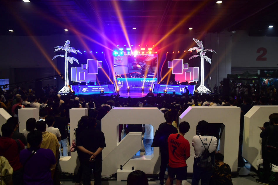 Visitors flock to the second day of CONQuest Festival, a weekend-long experience of gaming, technology, anime and pop culture, in Pasay City on July 24, 2022. The festival featured various college esports matches, distinguished creators, cosplay, displays, and booths. Mark Demayo, ABS-CBN News