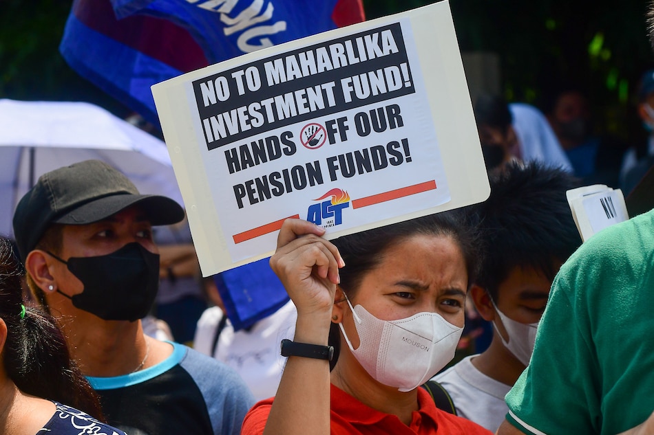 Protesters picket in front of the Senate in Pasay City on May 23, 2023, calling for the rejection of the Maharlika Investment Fund Bill. Mark Demayo, ABS-CBN News