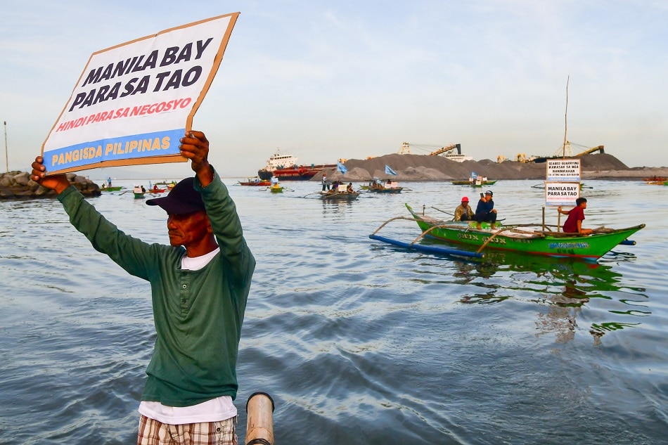 Fishermen conduct a fluvial protest, calling for their welfare and livelihood amid an ongoing reclamation project happening in front of the Philippine Senate in Pasay City on February 28, 2023. Mark Demayo, ABS-CBN News