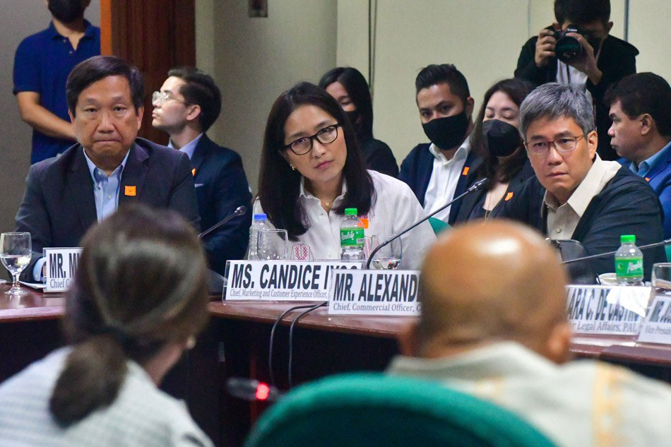 Cebu Pacific representatives (left to right) Chief Corporate Affairs officer Michael Ivan Shau, Chief Marketing and Customer Experience Officer Candice Iyog, and Chief Commercial Officer Alexander Lao during the Senate hearing on the Airline Passengers' Complaints Against Cebu Pacific in Pasay City on June 21, 2023. Mark Demayo, ABS-CBN News