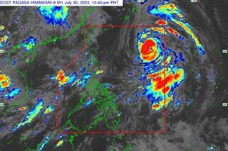 Falcon intensifies into typhoon as it remains over sea
