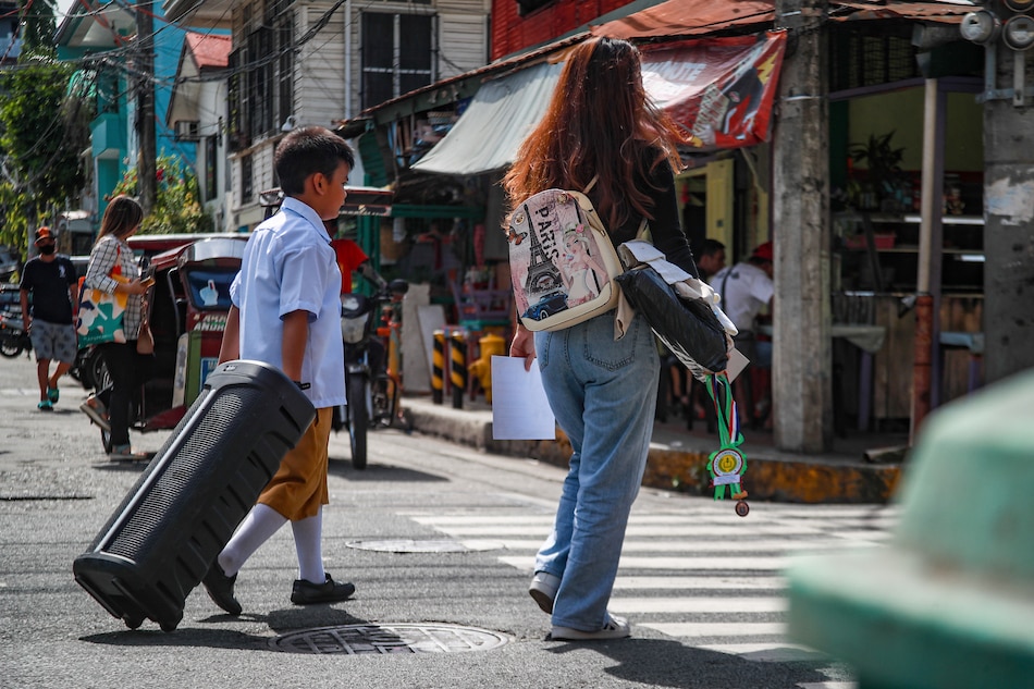 A student leaves after attending a recognition day activity at the Sta. Ana Elementary School in Manila on July 5, 2023. Jonathan Cellona, ABS-CBN news/File