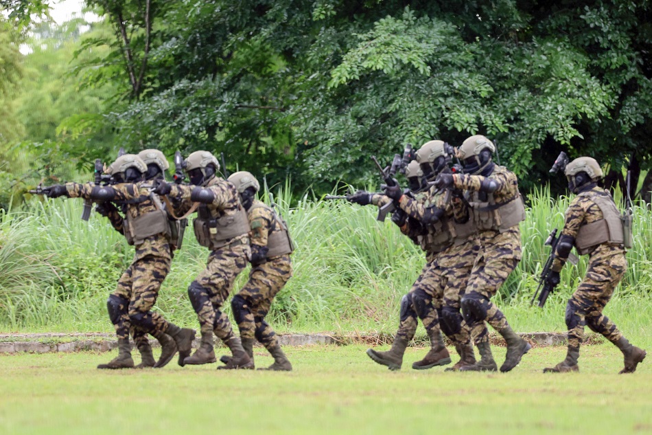 Members of the Philippine Army participate in a demonstration during the 61st Founding Anniversary of Special Forces Regiment (Airborne) at Fort Magsaysay in Palayan City, Province of Nueva Ecija on Sunday, June 25, 2023. Kj Rosales, PPA pool/File