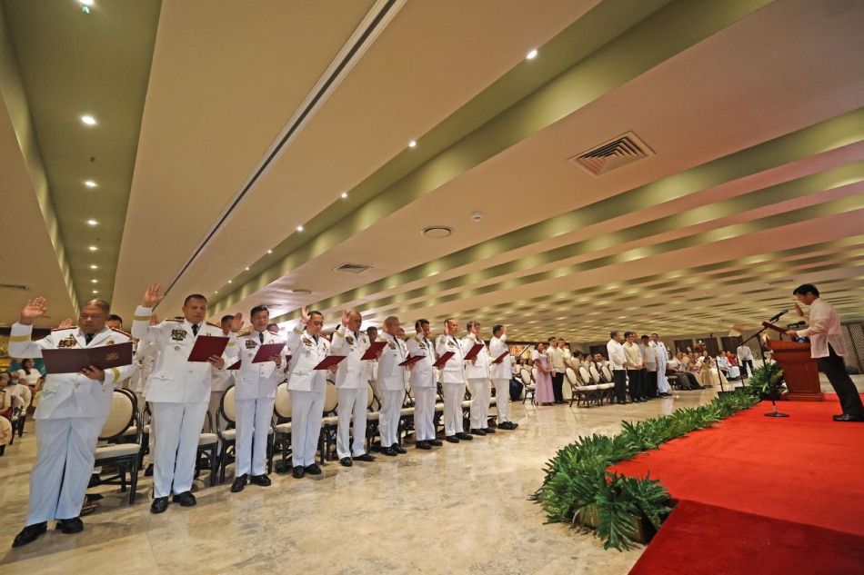 President Ferdinand Marcos Jr. administers the oath to newly promoted Philippine National Police officials at the Malacañang Palace on Tuesday, September 19, 2023. KJ Rosales, PPA pool.