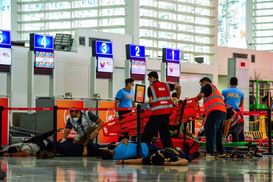 The Manila International Airport Authority (MIAA) and the Philippine National Police Aviation Security Group (PNP-ASG) conduct a security exercise at the NAIA Terminal 2 on Tuesday, October 3, 2023. The exercise simulates an active shooting and bombing incident within the airport vicinity. Maria Tan, ABS-CBN News