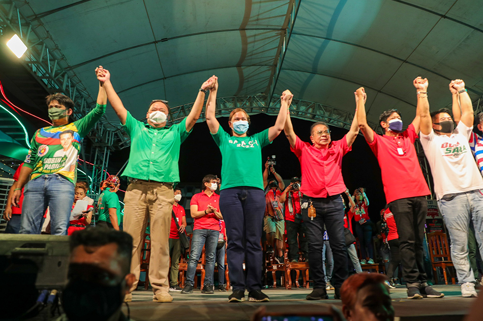 Halalan 2022 Presidential candidate Ferdinand Marcos Jr. along with running mate Davao City Mayor Sara Duterte-Carpio take the stage with members of UniTeam and local government officials during a campaign sortie in Narvacan, Ilocos Sur on February 17, 2022. Jonathan Cellona, ABS-CBN News/File.