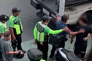 Motorist arrested for assaulting QC traffic enforcers