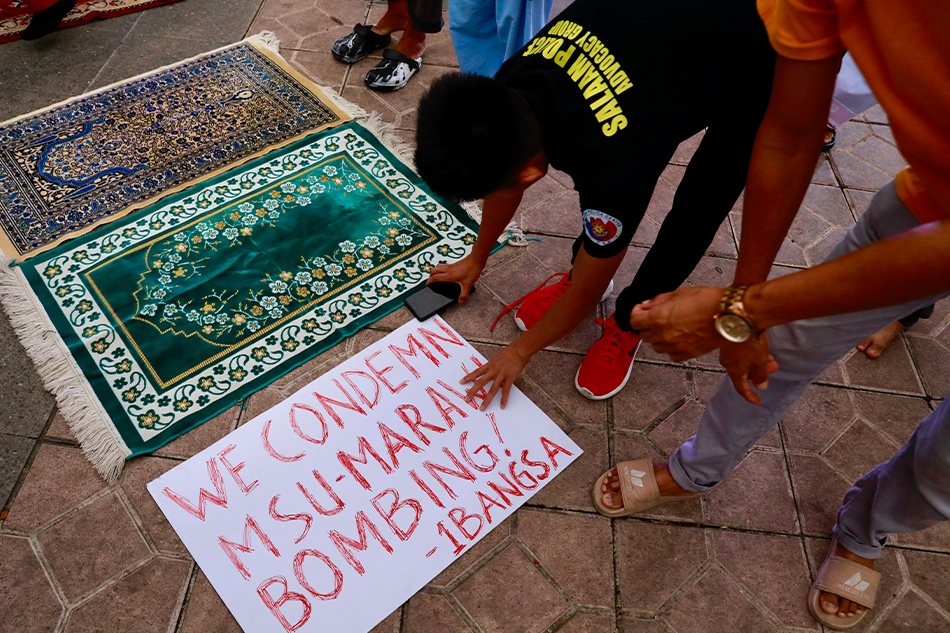 Filipino Muslims prepare to perform a prayer as they gather in solidarity with the victims of Mindanao island bomb attack, Manila, Philippines, December 3, 2023. Francis R. Malasig, EPA-EFE.