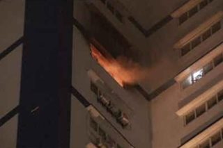 Fire hits high-rise building in Binondo