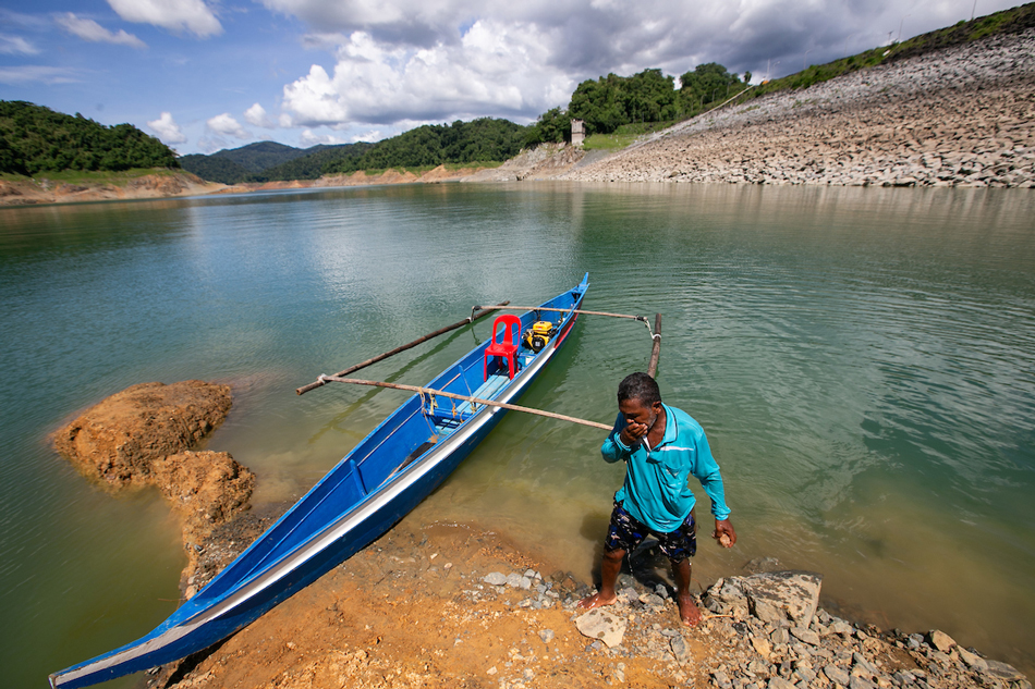 Dumagat elder Jimmy Cruz takes a quick dip as temperatures rise in Angat Watershed on July 8, 2023. Residents raised concerns on the rising temperature and its effect to the current water level of Angat Dam which impacts their food source, health, and livelihood. Gigie Cruz, ABS-CBN News/File 