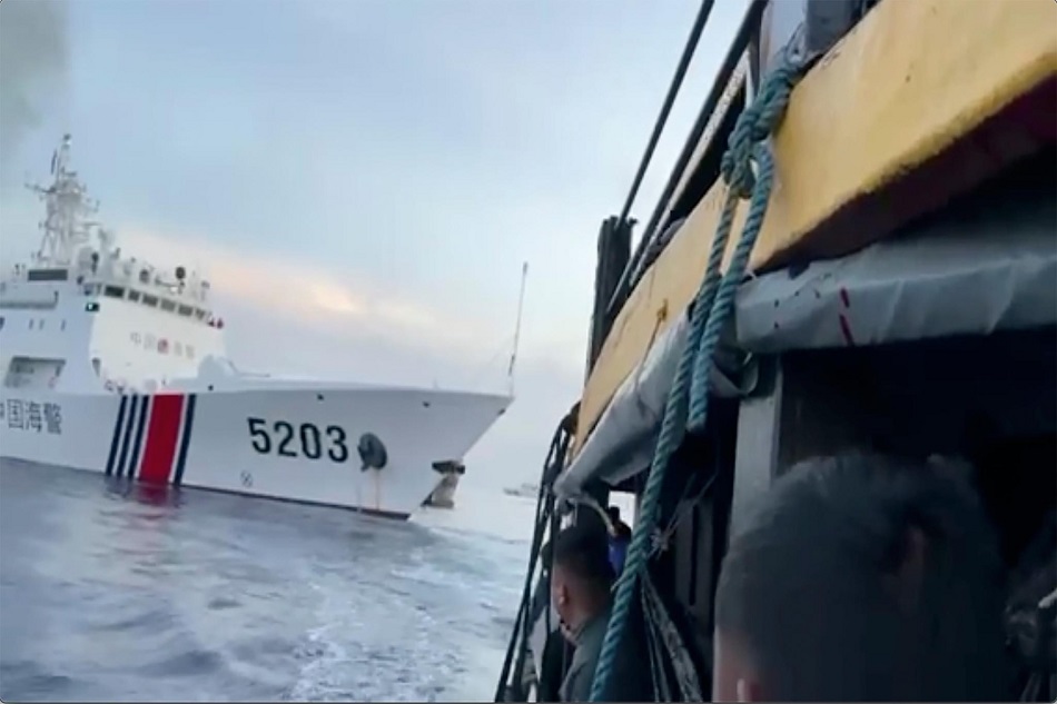 A handout frame grab photo from a video made available by the Philippine’s Armed Forces shows a Chinese coast guard ship with bow number 5203 after bumping a Philippine’s Armed Forces supply boat as they approach Second Thomas Shoal, locally called Ayungin Shoal, at the disputed South China Sea on October 22, 2023. Armed Forces of the Philippines handout, via EPA-EFE