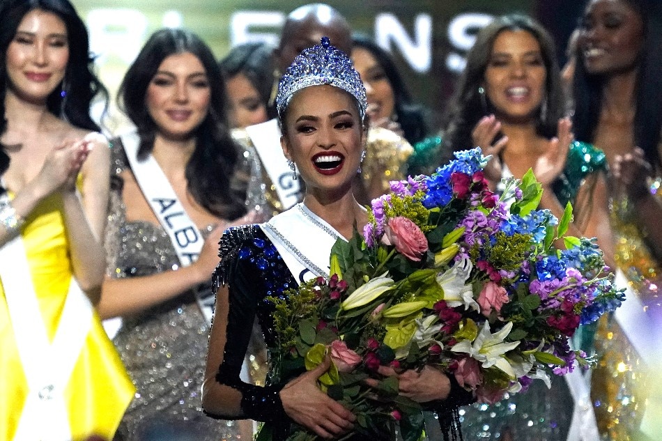 Miss USA R'Bonney Gabriel (center) celebrates after winning the 71st Miss Universe competition at the New Orleans Ernest N. Morial Convention Center in New Orleans, Louisiana on January 14, 2023. Timothy A. Clary, AFP