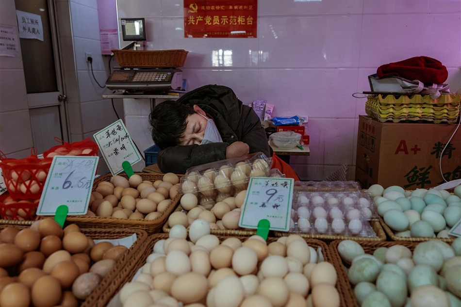 A man selling eggs takes a nap on the wet market in Shanghai, China, Jan. 11, 2023. China’s annual inflation rate rose to 1.8 percent in December 2022 over the previous month. In November 2022, the annual inflation rate was at an 8-month low of 1.6 percent, while China’s Consumer Price Index (CPI) is standing at 0 percent over the previous month, the National Bureau of Statistics reported. Alex Plavevski, EPA-EFE