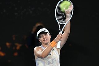 Tennis: Swiatek eases into third round at Australian Open
