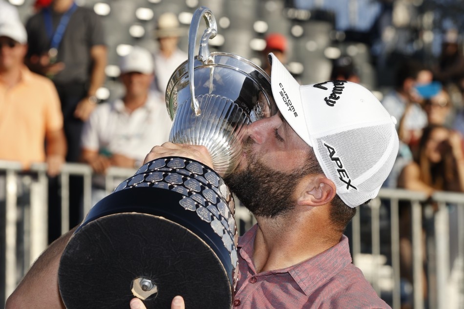 Spanish golf player Jon Rahm poses with the trophy after winning the Acciona Open de Espana (Spanish Golf Open) in Madrid, Spain, 09 October 2022. File photo. Luis Tejido, EPA-EFE.