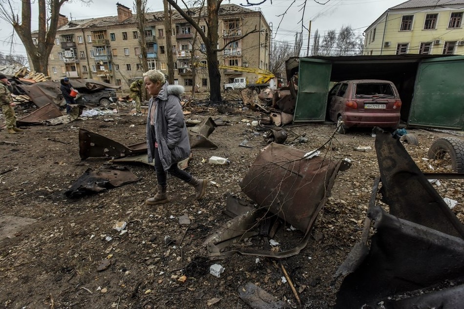 A local woman walks near the site of a Russian rocket strike in Konstyantynivka town, Donetsk region, eastern Ukraine, 28 January 2023. Three civilians were killed, and at least two injured as a result of Russia’s missile strike on the city of Kostyantynivka, according to Pavlo Kyrylenko, the head of the regional administration. Oleg Petrasyuk, EPA-EFE
