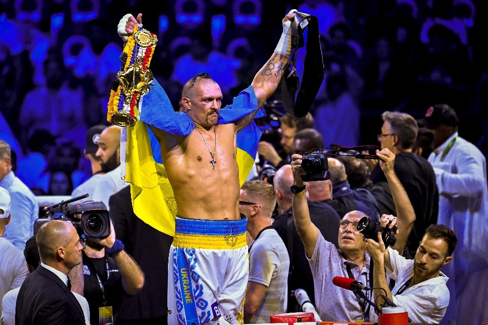 Oleksandr Usyk (C) of Ukraine, reacts after defeating Anthony Joshua of Great Britain in their world heavyweight title fight at the Jeddah Superdome, Saudi Arabia, 21 August 2022. File photo. Ali Hamed Khamaj, EPA-EFE