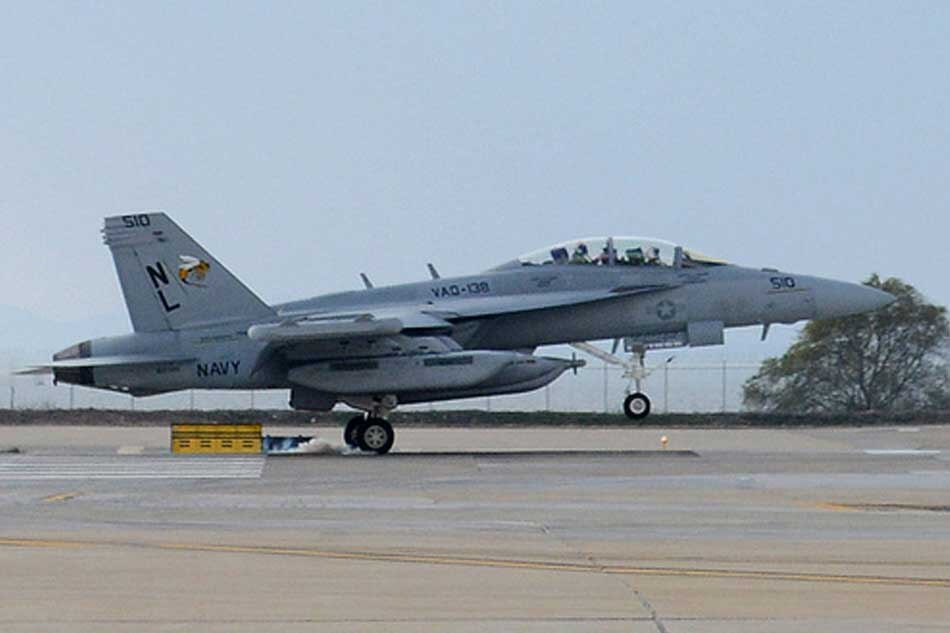 A U.S. Navy EA-18G Growler airborne electronic attack aircraft arrived at Clark Air Base, June 15, for training with Armed Forces of the Philippines (AFP) FA-50 aircraft pilots. File photo shows the aircraft landing on the runway of Kunsan Air Base, South Korea. Photo courtesy of U.S. Navy, MC1 Frank L. Andrews