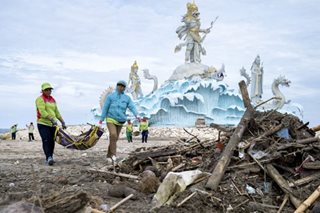 Debris removal at Bali beach