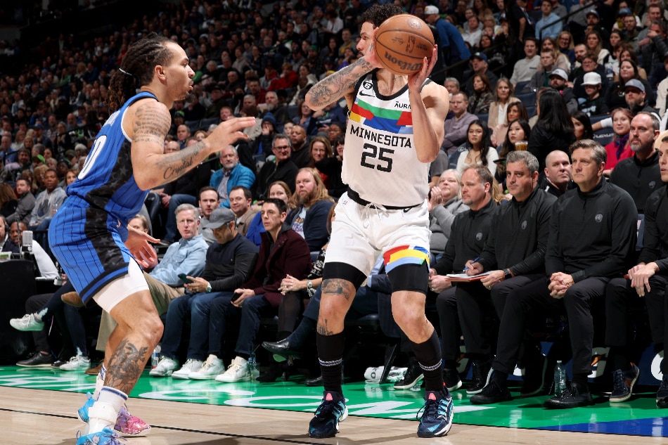 Austin Rivers #25 of the Minnesota Timberwolves handles the ball during the game against the Orlando Magic on February 3, 2023 at Target Center in Minneapolis, Minnesota. David Sherman, NBAE via Getty Images/AFP