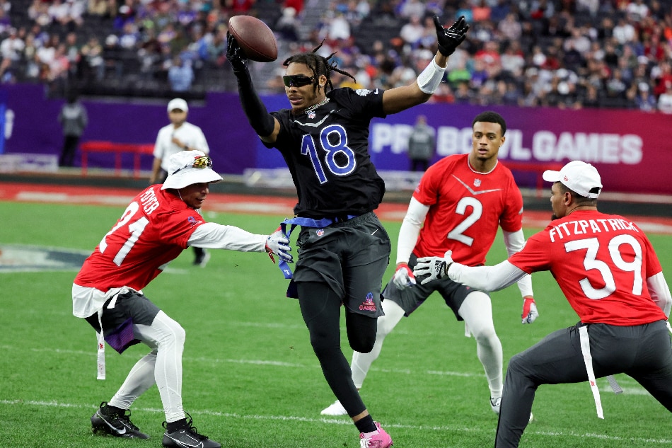 Justin Jefferson #18 of the Minnesota Vikings and NFC carries the ball against the AFC during the 2023 NFL Pro Bowl Games at Allegiant Stadium on February 05, 2023 in Las Vegas, Nevada. Ethan Miller, Getty Images/AFP