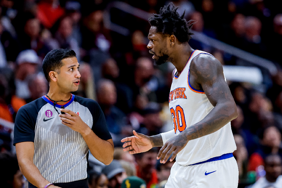 New York Knicks forward Julius Randle (R) disputes a call made against him by NBA referee Suyash Mehta (L) during the second half of their game against the Atlanta Hawks at State Farm Arena in Atlanta, Georgia, USA, 20 January 2023. Erik S. Lesser, EPA-EFE