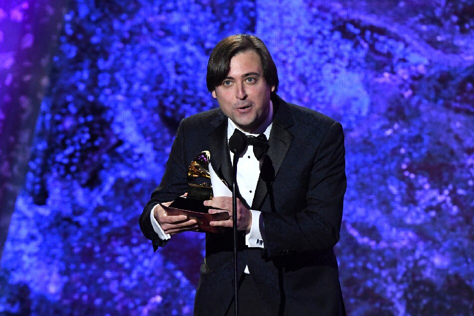 Conductor of the New York Youth Symphony Michael Repper accepts the award for Best Orchestral Performance during the pre-telecast show of the 65th Annual Grammy Awards at the Crypto.com Arena in Los Angeles on February 5, 2023. Valerie Macon, AFP