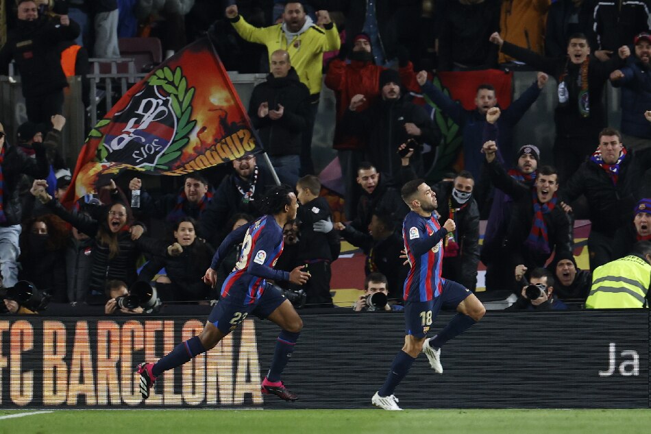 FC Barcelona's defender Jordi Alba (R) celebrates after scoring a goal against Sevilla during their La Liga match at the Camp Nou stadium in Barcelona, Spain, 05 February 2023. Toni Albir, EPA-EFE