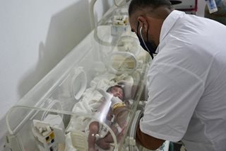 Syria family takes in baby born under quake rubble