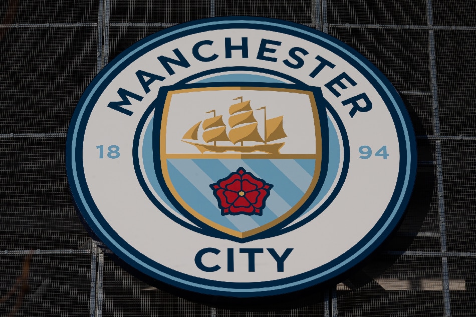 A general view of the Manchester City club crest at the Etihad stadium in Manchester, Britain, 06 February 2023. Manchester City have been charged with over 100 breaches of Premier League financial rules following a four year investigation. Adam Vaughan, EPA-EFE