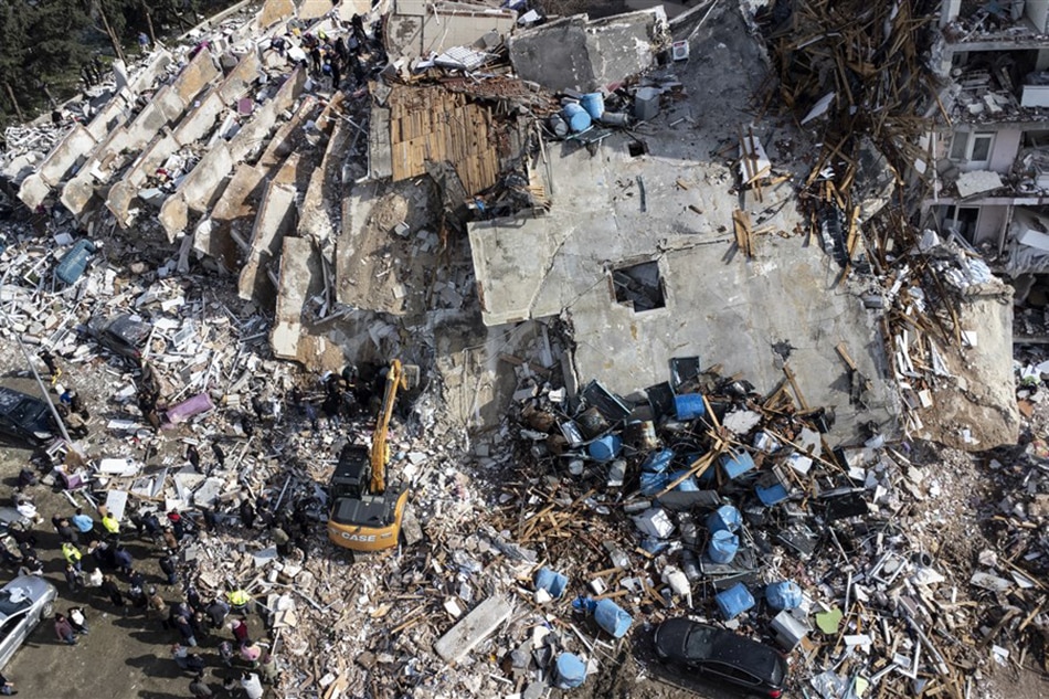 A photo taken with a drone shows an aerial view over collapsed buildings after an earthquake in Antakya, district of Hatay, Turkey, February 7, 2023. Erdem Sahin, EPA-EFE/File