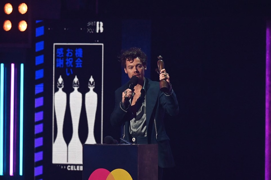 Harry Styles with his award for Album of the Year during the 2023 BRIT Awards ceremony at The O2 arena in London, Britain, 11 February 2023. The annual pop music awards are presented by the British Phonographic Industry. Neil Hall, EPA-EFE