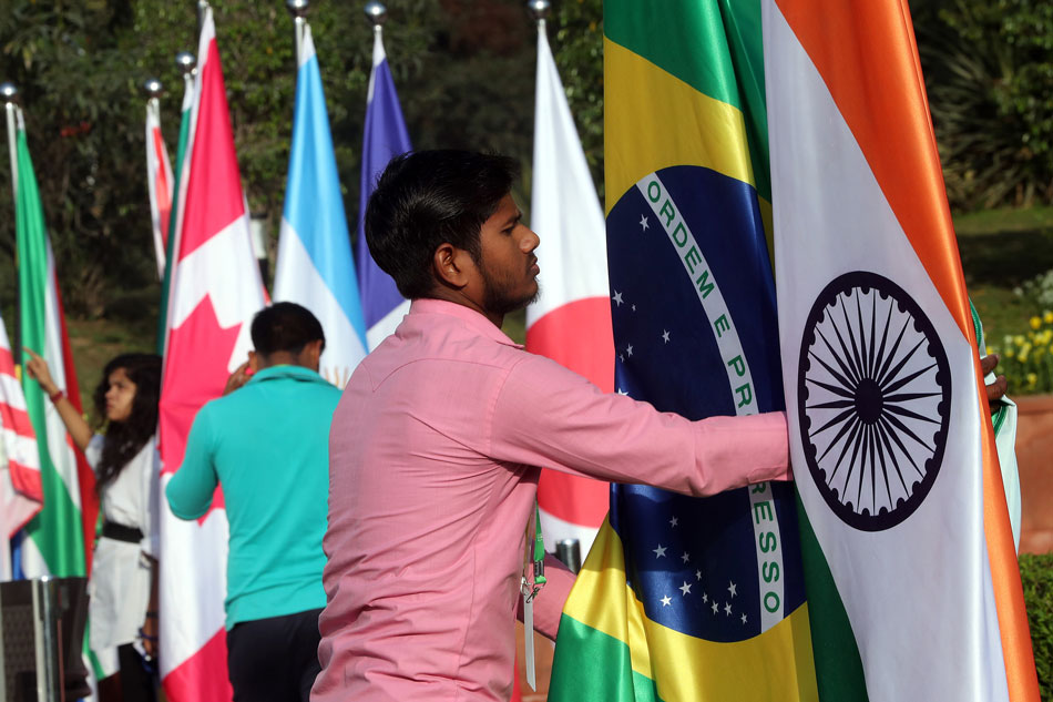 A man arranges participating countries
