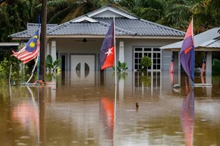 At least 4 dead, tens of thousands evacuated in Malaysia floods