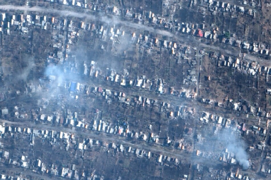 A handout satellite image made available by Maxar Technologies on 10 March 2023 shows burning and destroyed residential areas amid the ongoing battle for Bakhmut, Ukraine, 06 March 2023 (issued 10 March 2023). Russian troops entered Ukrainian territory on 24 February 2022, starting a conflict that has provoked destruction and a humanitarian crisis. EPA-EFE/MAXAR TECHNOLOGIES HANDOUT -- MANDATORY CREDIT: SATELLITE IMAGE 2022 MAXAR TECHNOLOGIES