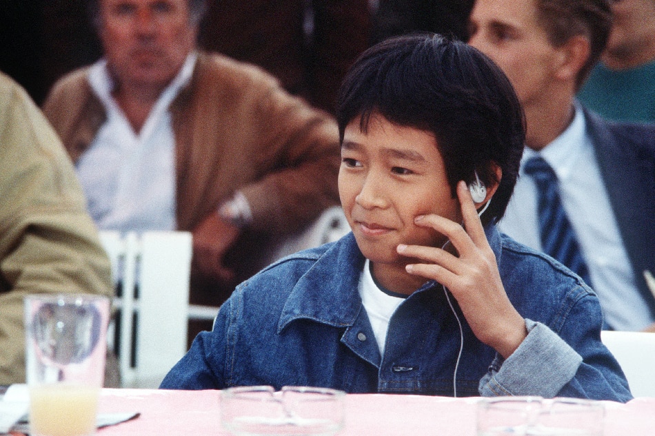 Vietnamese American actor Jonathan Ke Quan (Ke Huy Quan), starring in' Indiana Jones and the Temple of Doom' film, poses on September 07, 1984 during the 10th American Film Festival of Deauville. MYCHELE DANIAU / AFP