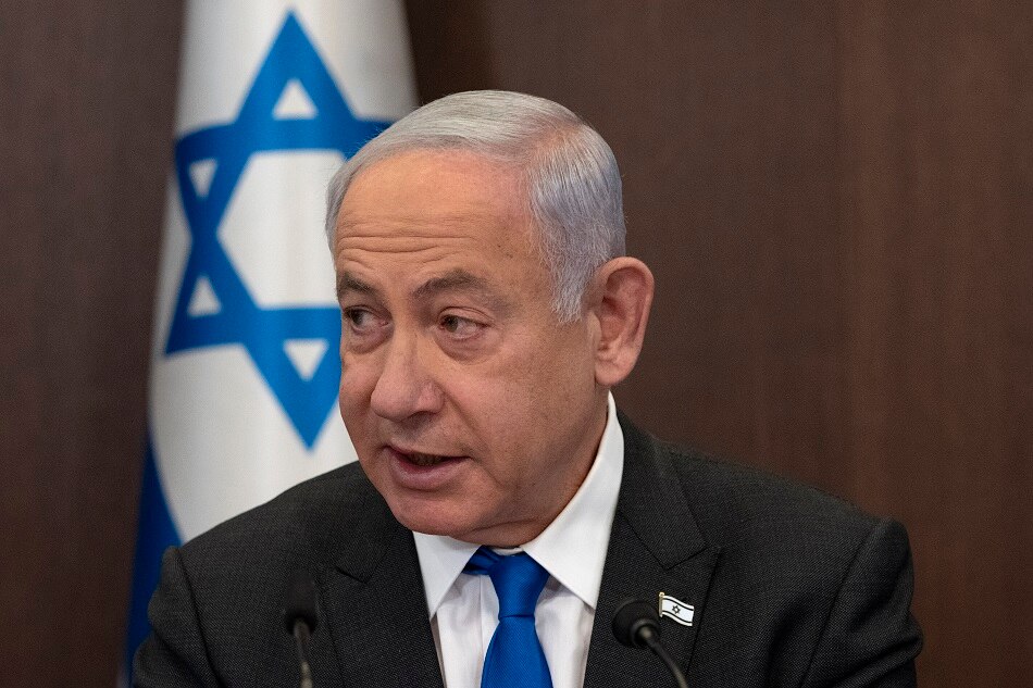 Israel’s Prime Minister Benjamin Netanyahu makes opening remarks at the weekly cabinet meeting in Jerusalem, 12 March 2023. Maya Alleruzzo, EPA-EFE.