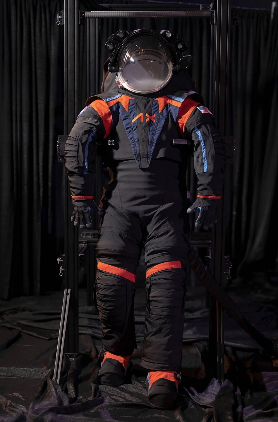 A handout picture made available on 15 March 2023 by Axiom Space shows the Artemis III spacesuit prototype, the AxEMU. Axiom Space designed the space suit for NASA's first long-term presence on the Moon. EPA-EFE/Axiom Space Handout.
