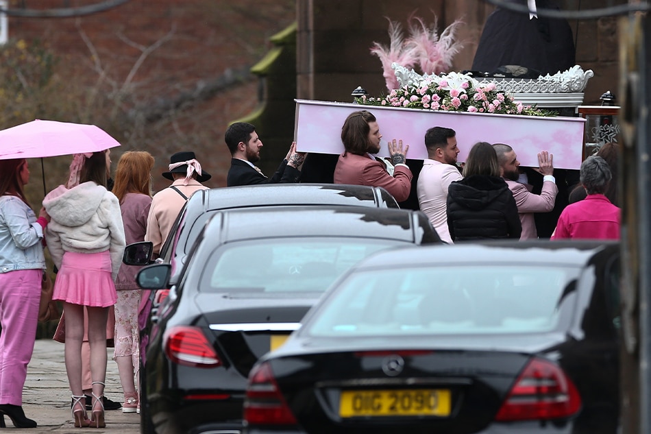 The coffin of schoolgirl Brianna Ghey is carried into St Elphin's Parish Church in Warrington, Britain, 15 March 2023. Brianna Ghey, a 16-year-old transgender girl, was murdered in Culceth Linear Park near Warrington on 11 February 2023. Two 15-year-olds have been charged with her murder, which police are yet to establish motive for. Adam Vaughan, EPA-EFE.