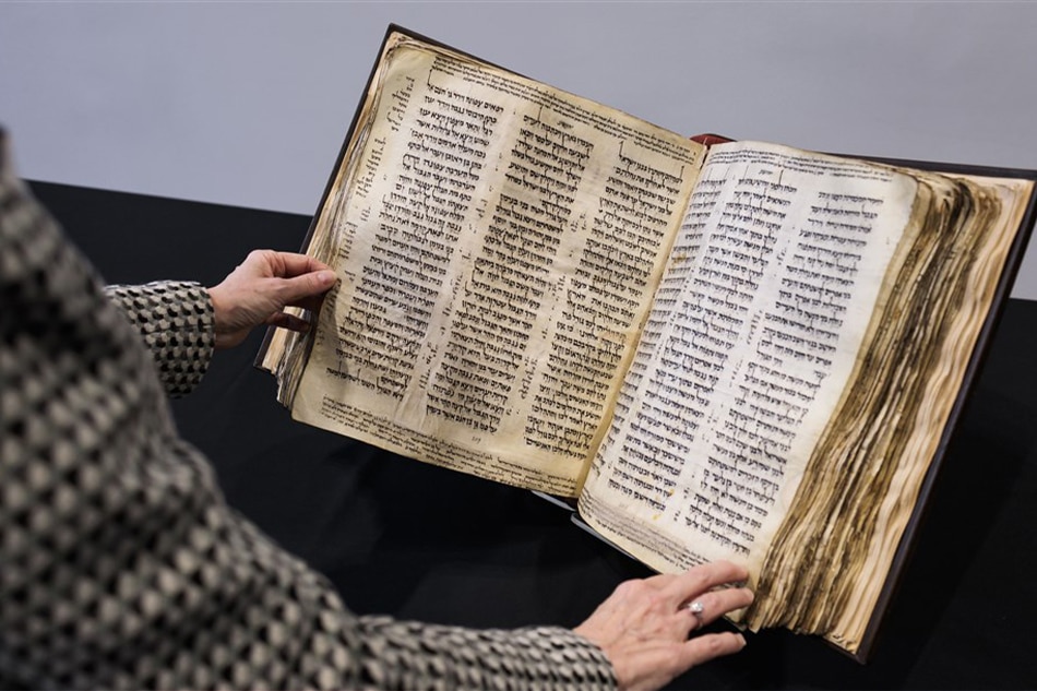 The Codex Sassoon, the earliest and most complete known Hebrew Bible, is shown during an auction preview for the centuries-old manuscript at Sotheby’s in New York, New York, USA, 15 February 2023. The bound, parchment text, which was once owned by David Solomon Sassoon and dates from the late ninth to early tenth century, is expected to sell for USD 30 to 50 million when is goes up for auction. Justin Lane, EPA-EFE