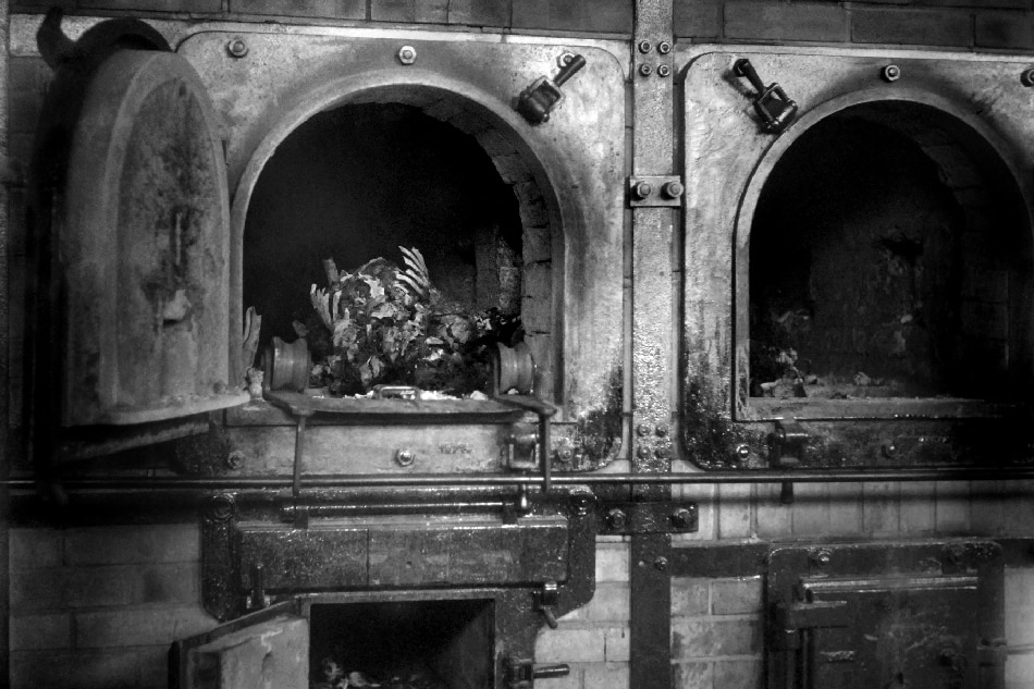 A body is seen in a crematory oven in the Buchenwald concentration camp in April 1945. The construction of Buchenwald camp started 15 July 1937 and was liberated by US General Patton's army 11 April 1945. Between 239,000 and 250,000 people were imprisoned in this camp. About 56,000 died among which 11,000 Jews. ERIC SCHWAB / AFP