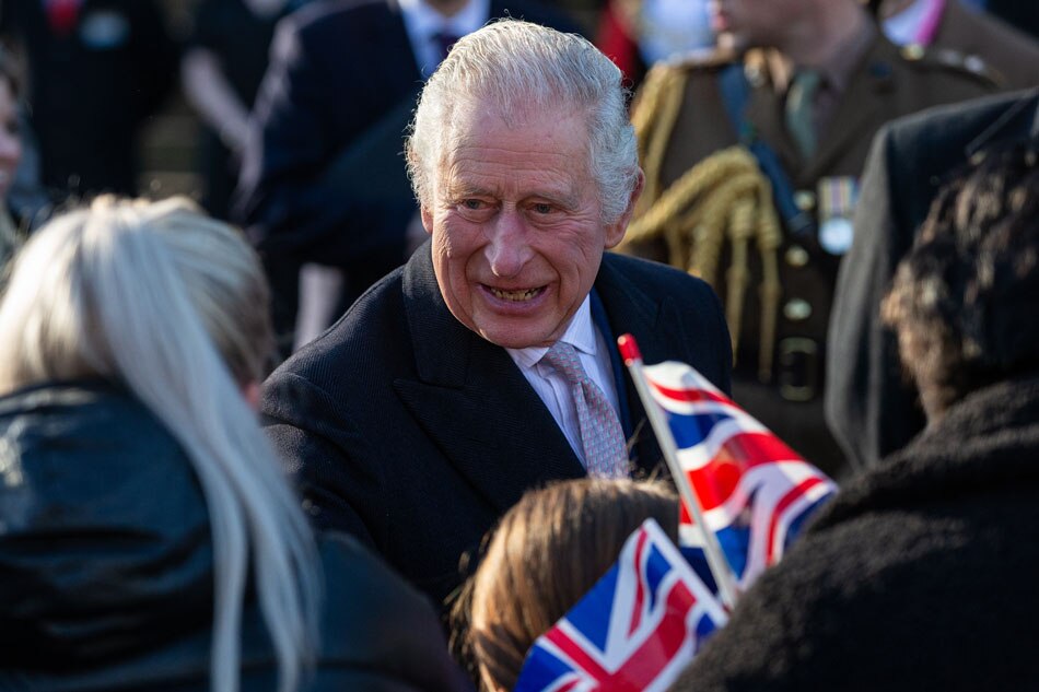  Britain's King Charles III (C) greets members of the public outside Bolton Town Hall in Bolton, Britain, January 20, 2023. The royal couple met representatives from the community in Bolton including Bolton Asian Elders, Bolton's Polish community and the Association of Ukrainians in Britain. Adam Vaughan, EPA-EFE.