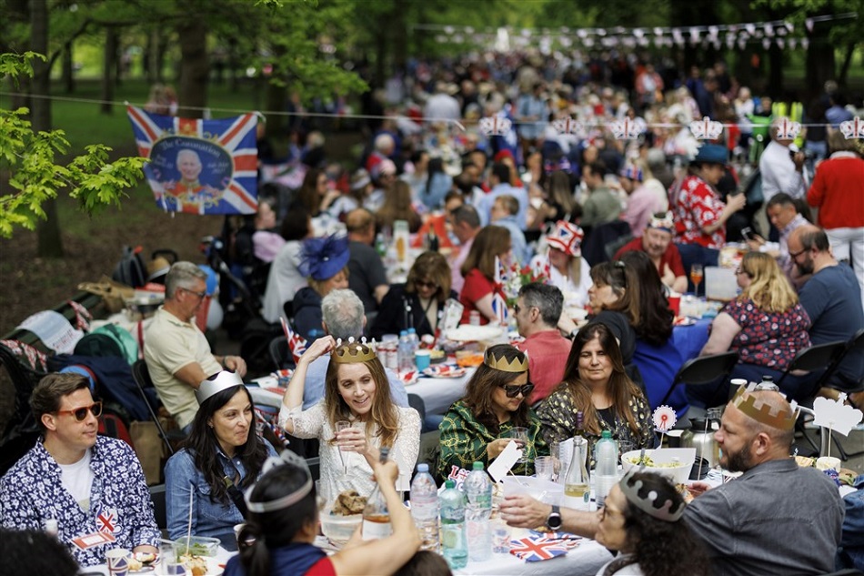 People join a street party to celebrate the Coronation of Britain