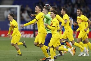 Barcelona win La Liga title with Espanyol rout
