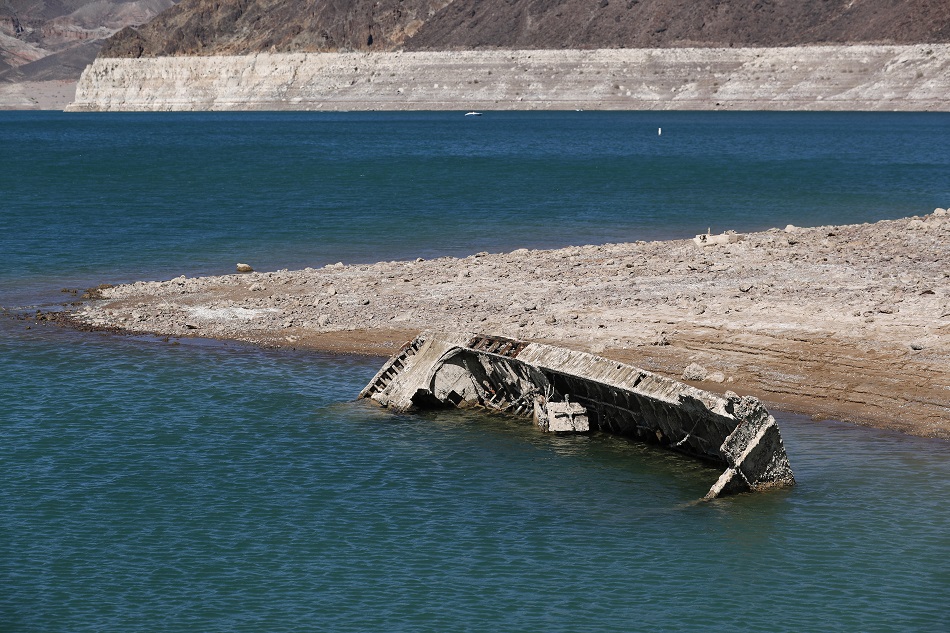 A WWII-era Higgins landing craft is revealed on the shoreline at the Lake Mead National Recreation Area, as the waterline continues to lower at Lake Mead in Boulder City, Nevada, USA, 01 July 2022. Caroline Brehman, EPA-EFE