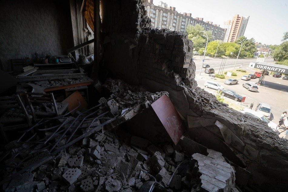 A view of damages at an administrative building after an overnight shelling by shock drones in Kyiv, Ukraine, May 28, 2023 amid the Russian invasion. Sergey Dolzhenko, EPA-EFE.